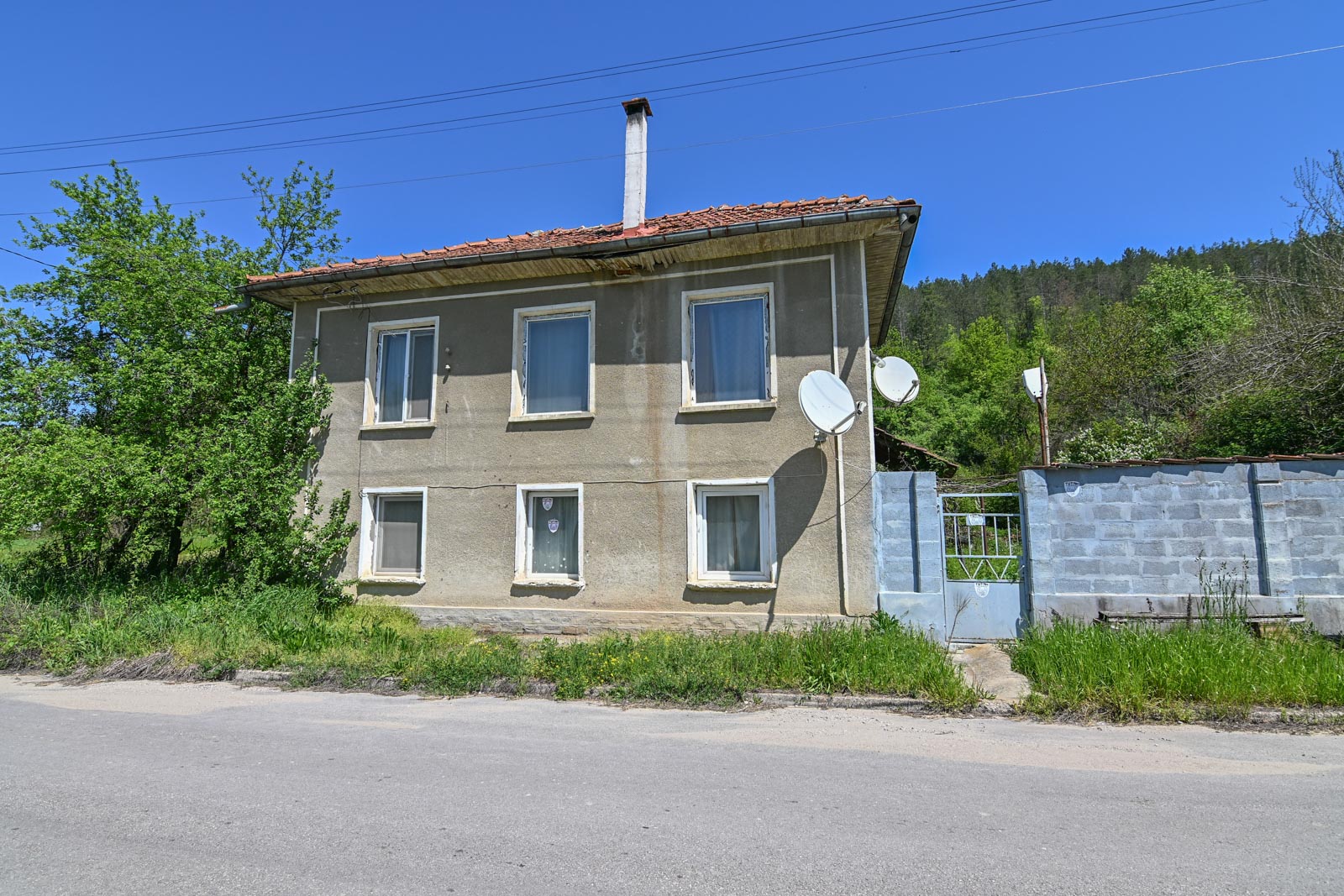 Small rural house on the edge of the village Gabene